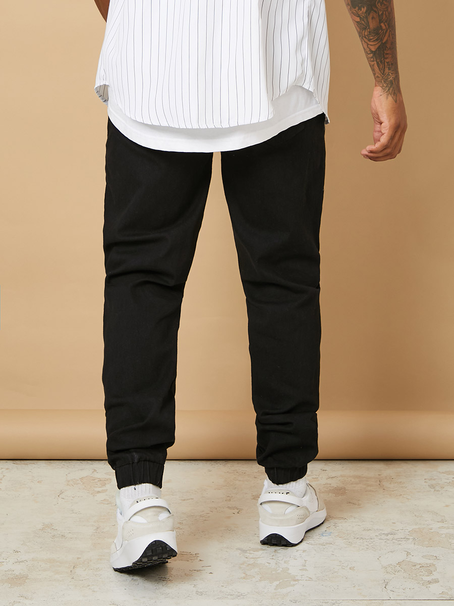 black ripped jean joggers