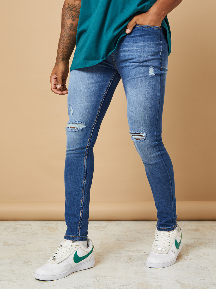 Super Skinny Jeans with Knee Rip Detail For Men at UAE Styli