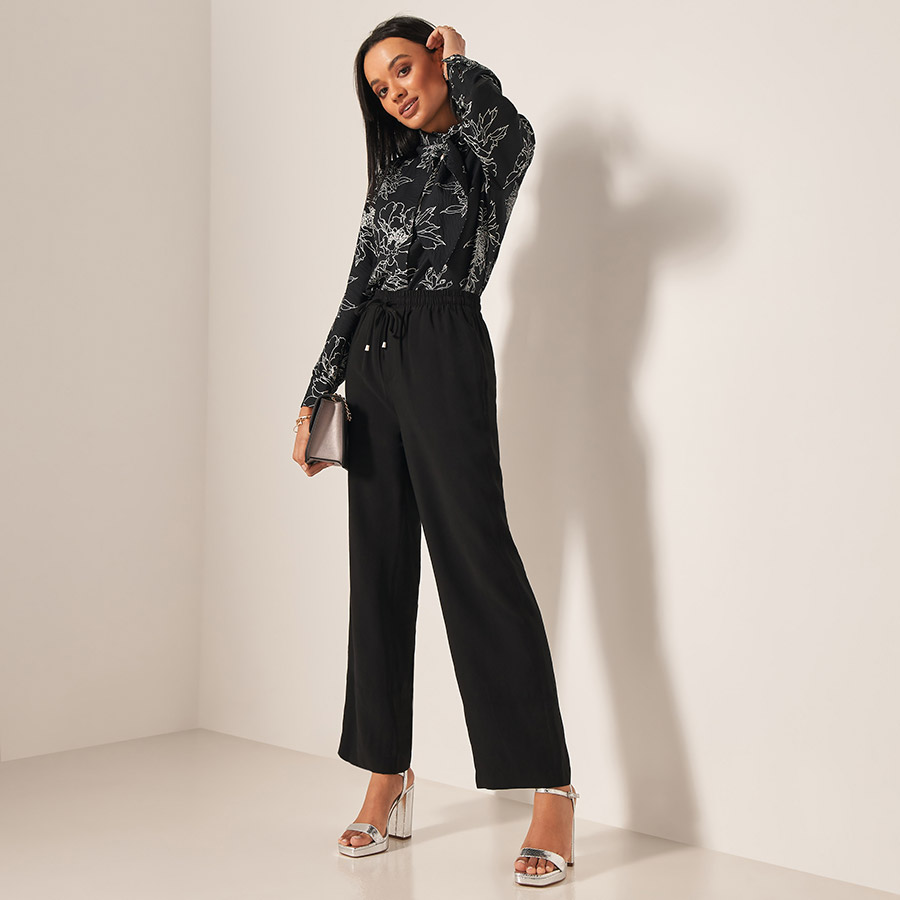 Fabric trousers with an elastic waistband | Trousers & Jeans | Fashion