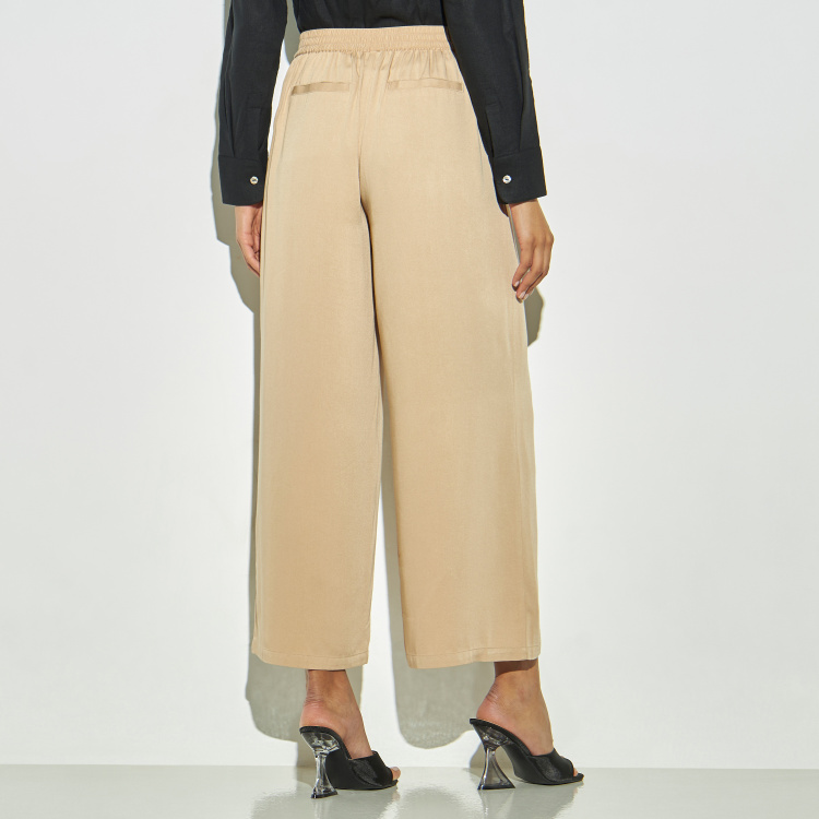 Buy Solid Palazzo Pants with Pockets and Tie-Ups