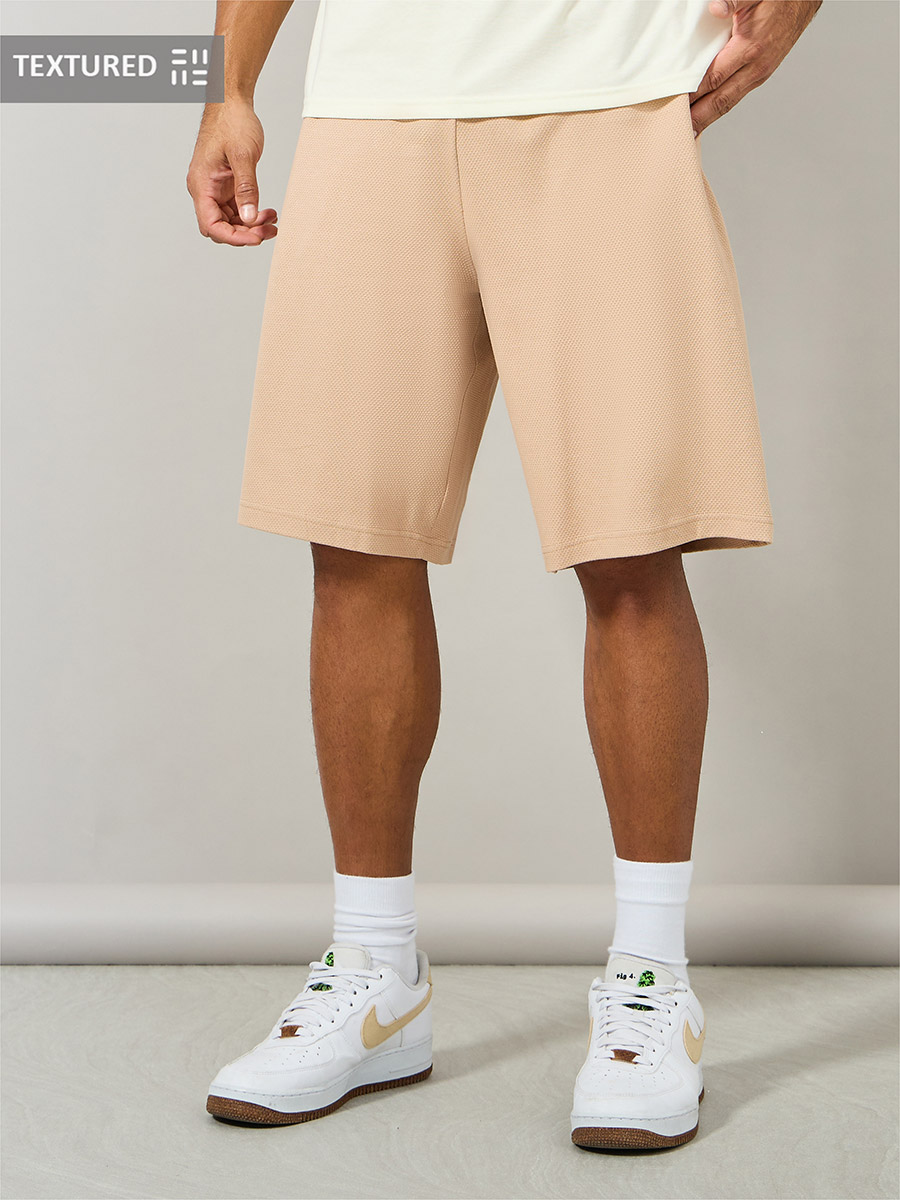 【送料&関税込】Golden  Lionel Knitted Shorts Yellow layered twill cargo shorts - men - WALES BONNER