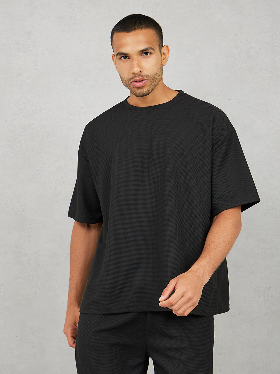 Buy Solid Textured Knit Oversized Streetwear T-Shirt and