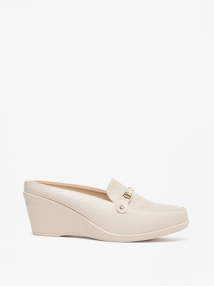Buy Textured Metal Accent Wedge Heel Loafers Beige For Women Styli Saudi